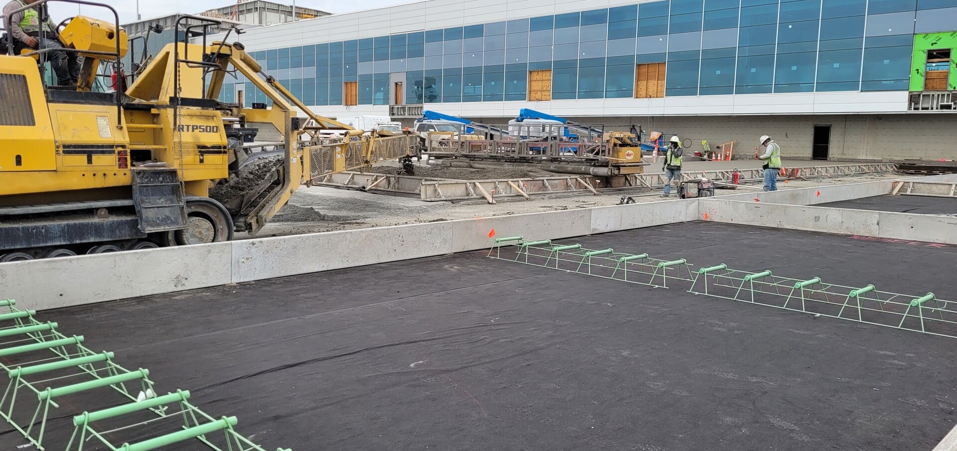 A construction crew is working on a construction site.